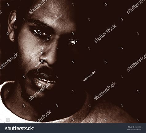 Portrait Of A Very Sad Black Man Crying Stock Photo