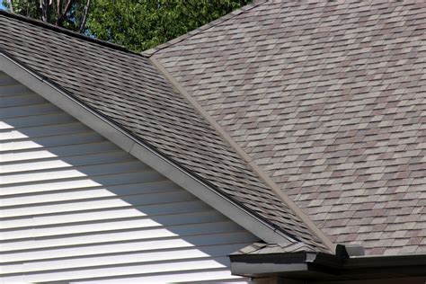 This article is intended to break down the features of asphalt composition laminated shingles produced by the major brands in the united states. New Grand Haven Roof - Werner Roofing