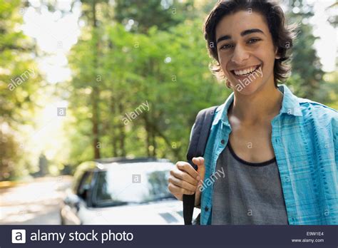 Portrait Of Smiling Teenage Boy In Woods Stock Photo Alamy