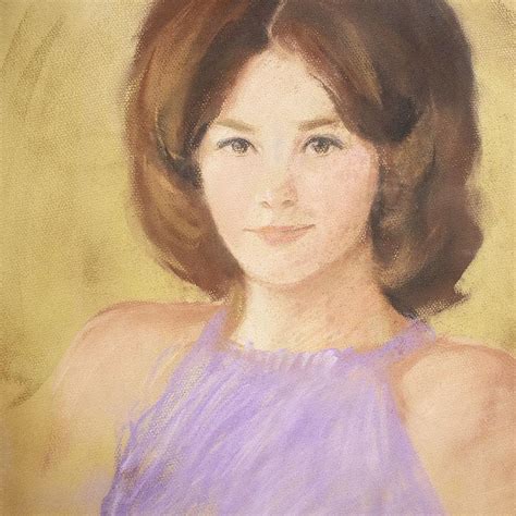 Pastel Portrait Of A Woman With Dark Hair And Purple Top