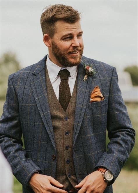 Groom In Blue Checked Suit With Brown Tweed Waistcoat Image By