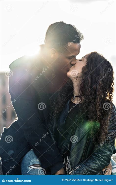 Happy Young Interracial Couple Kissing Stock Image Image Of Kiss Madrid 246175865