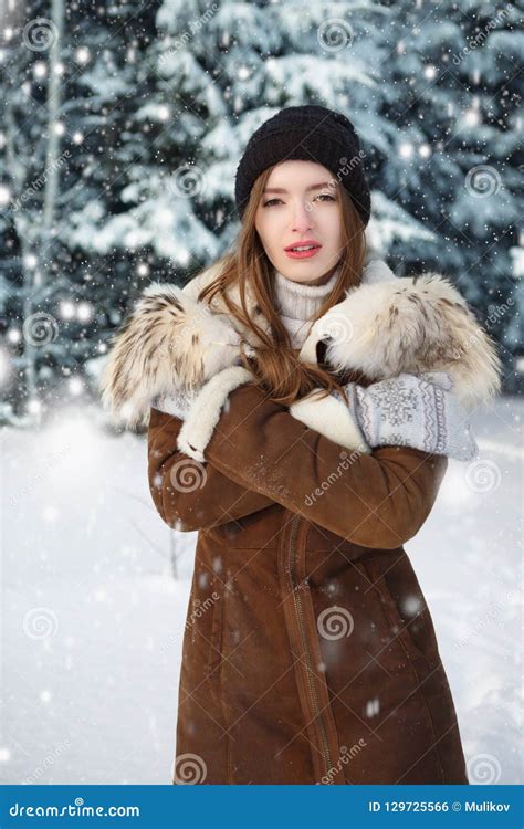 Beautiful Winter Portrait Of Young Woman In The Winter Snowy Forest