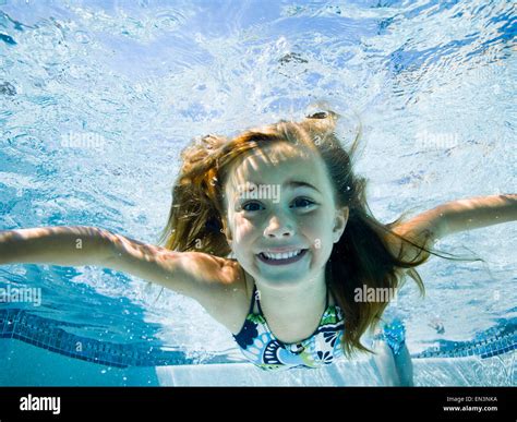 Girl In A Swimming Pool Stock Photo Alamy