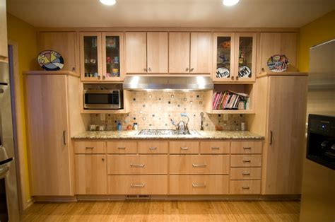 If your chairs are feeling dated as well, paint them the same color as the cabinets. Natural Maple Kitchen - Traditional - Kitchen ...