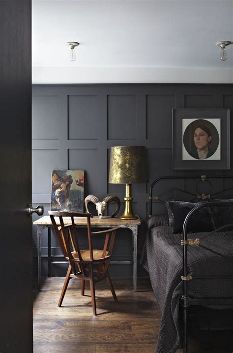 In this large open concept living room, the ceiling has been painted the same dark shade as the walls. Decorating Ideas for Dark Rooms - Sophie Robinson