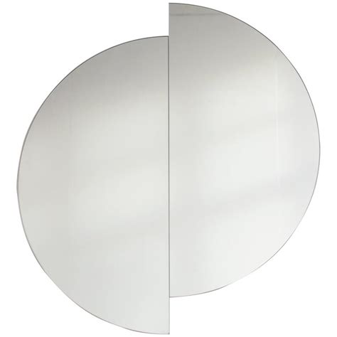 Large round mirrors can be a statement piece in every room in the house, adding a stunning chic factor to entryways, living rooms, bathrooms, and bedrooms alike. Silver Tinted Luna Orbis™ Round Mirror (2 Half-Moon pieces ...