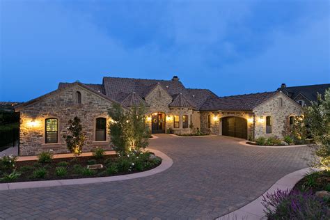 Custom Home With Artesian Ranch Exterior By Mdd Homes With Stone Walls