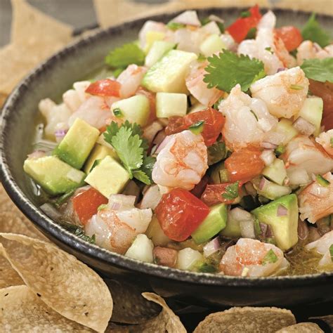 Cool and tasty shrimp ceviche recipe, shrimp served with chopped red onion, chile, cilantro, cucumber, avocado with lemon and lime juices. Shrimp Ceviche Recipe - EatingWell