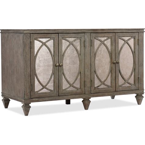 Hudson large cabinet features corner drawers in the top part of the cabinet, one large cabinet in the middle, and two smaller cabinets on each side. Hooker Furniture Rustic Glam Rustic Glam Credenza with ...