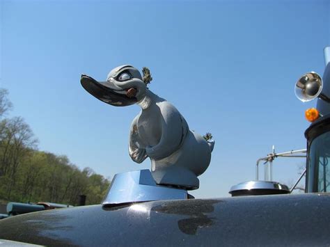 Hood ornaments were popular in the 1920s, 1930s, 1940s, and 1950s with many auto manufacturers fitting them to their vehicles. Rubber Duck hood ornament on "Convoy" Mack RS700L at ...