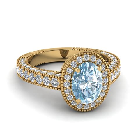 Average customer rating $5 out of 5 stars. Vintage Oval Shaped Aquamarine Halo Engagement Ring In 14K Yellow Gold | Fascinating Diamonds