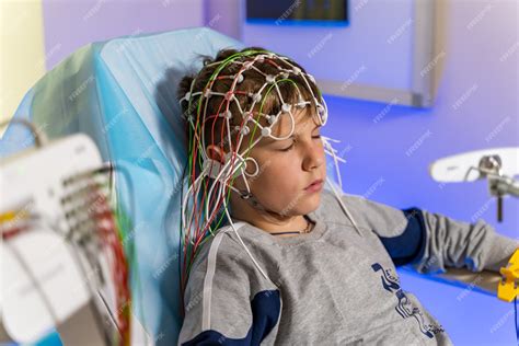 Premium Photo Eeg Electrode Placement To Patient During Eeg Record