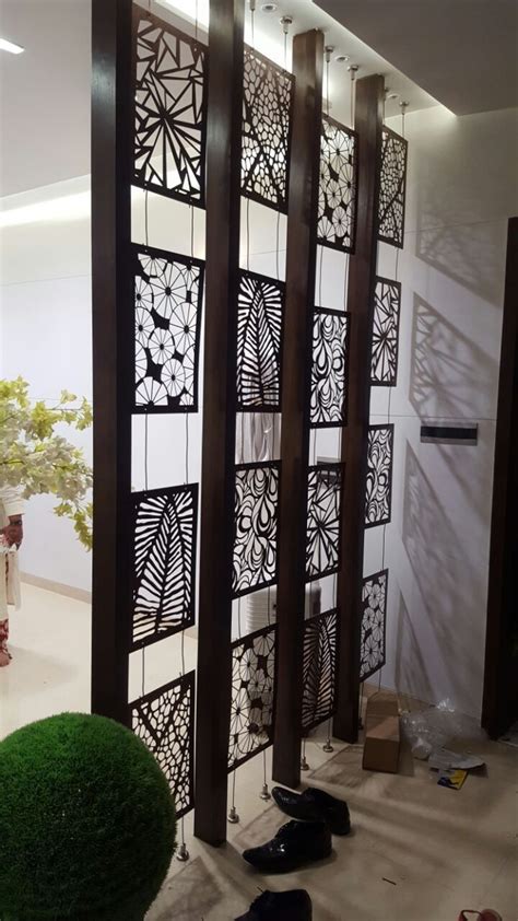 The Room Dividers Are Decorated With Black And White Designs