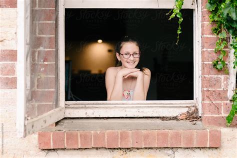 Portrait Of A Teen Girl In A Window By Stocksy Contributor Gillian Vann Stocksy
