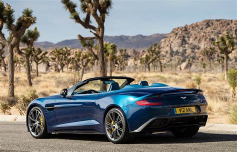 V12 vanquish is a car beloved by modern day enthusiasts and also heritage collectors alike. 2014 Aston Martin V12 Vanquish Volante Rear 7-8 Left ...