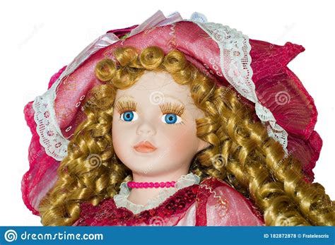 Plastic Doll Portrait Closeup Blue Eyes And Curly Blonde Hair
