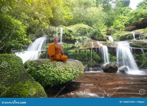 Buddha Monk Practice Meditation At Waterfall Editorial Stock Image