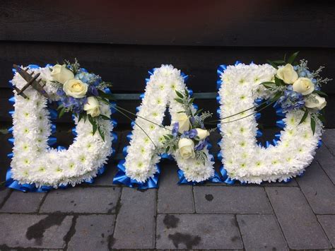 About fleurtations the nottingham funeral florist. Dad funeral letters, white basing, blue and white sprays ...