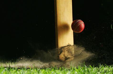 Closeup Shot Of Cricket Bat Hitting Ball Stock Photo Download Image