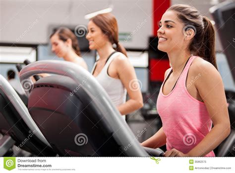 Group Of Women On A Treadmill Stock Image Image Of