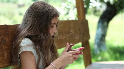 Girl Playing The Game On His Smartphone Stock Footage Video Of Merry Gladness 67275426