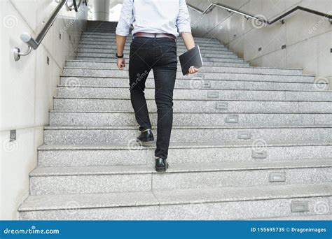 Businessman Walking Up The Stairs Stock Image Image Of Steps