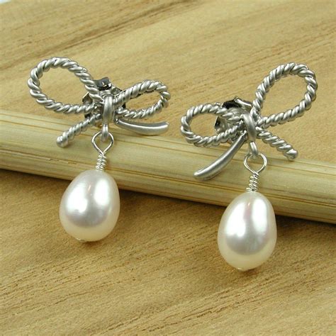 Silver Bows And Pearls Earrings Etsy Pearl Earrings Silver Bow
