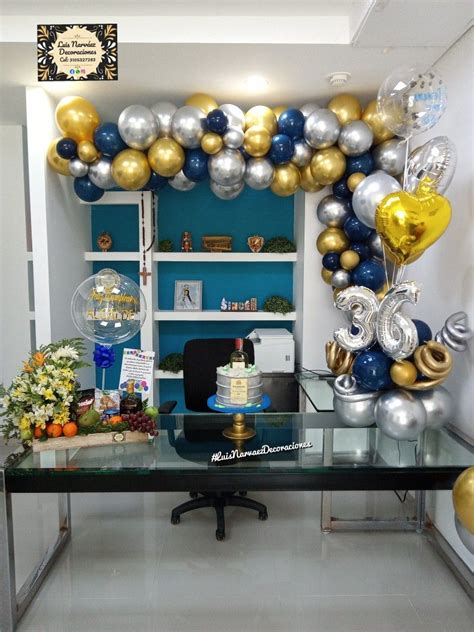 Decoración de oficina en globos cromados dorados plateados y azul
