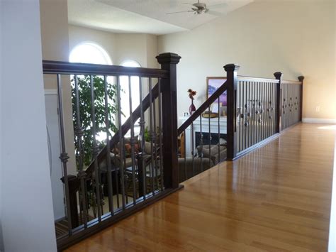 After some exchanges to determine the style of the top rail and the ballusters. Spindle Railing - Traditional - Living Room - Edmonton ...