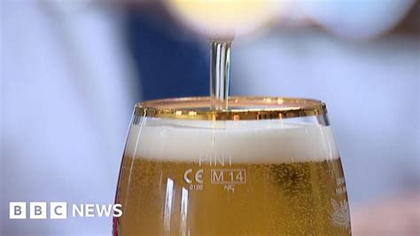 drinking limits for men reduced to 14 units each week bbc news