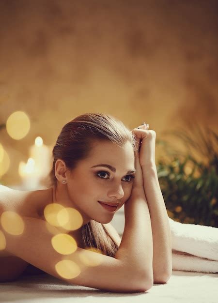 Free Photo Beautiful Young Woman Lying And Waiting For Her Massage Spa Concept