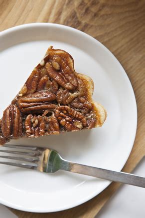 In a large bowl whisk the light corn syrup, 1/2 cup brown sugar, 3 eggs, vanilla extract, 1/4 teaspoon ground cinnamon and 6 tablespoons melted unsalted butter together until smooth. "Loveless" Pecan Pie | Paula Deen