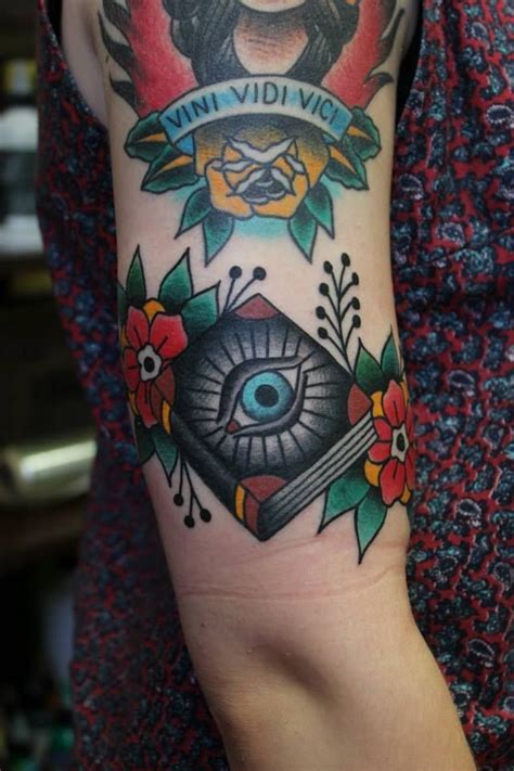 Vintage book tattoo on shoulder by justice ink. 8fb1f9706d33049df0779e834097ab79--traditional-books ...
