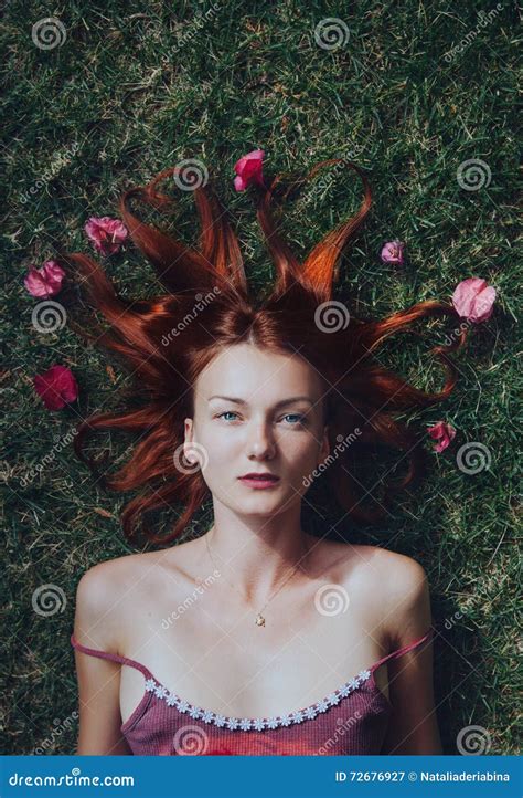 Beauty In Nature Woman Portrait On Flowers Background Stock Image