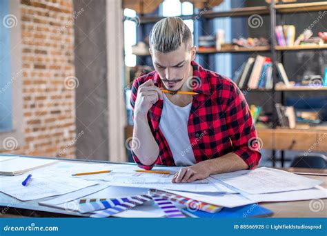 Male Architect With Blueprints Stock Photo Image Of Realistic Style