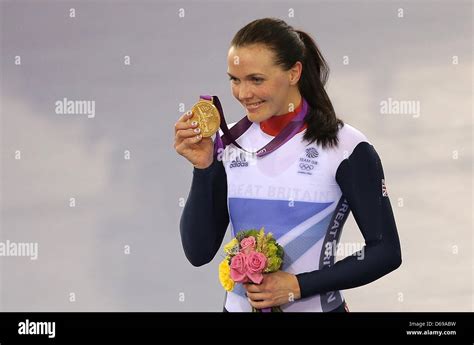 Victoria Pendleton Of Great Britain Poses With Her Gold Medal During