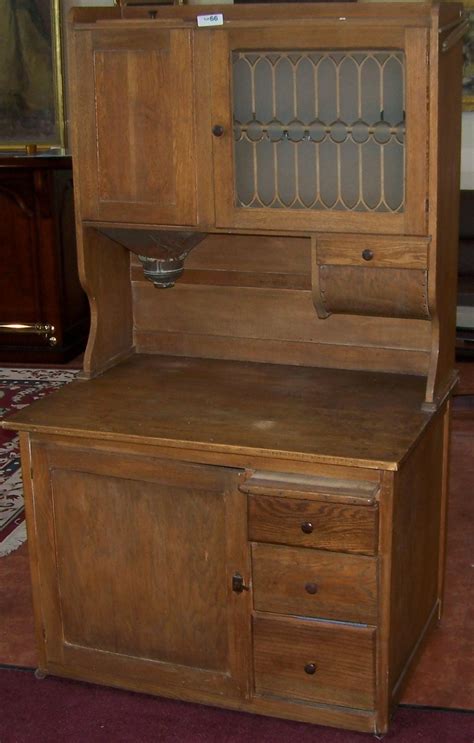 This baker's cabinet is in excellent condition. Antique Hoosier Baking Cabinet