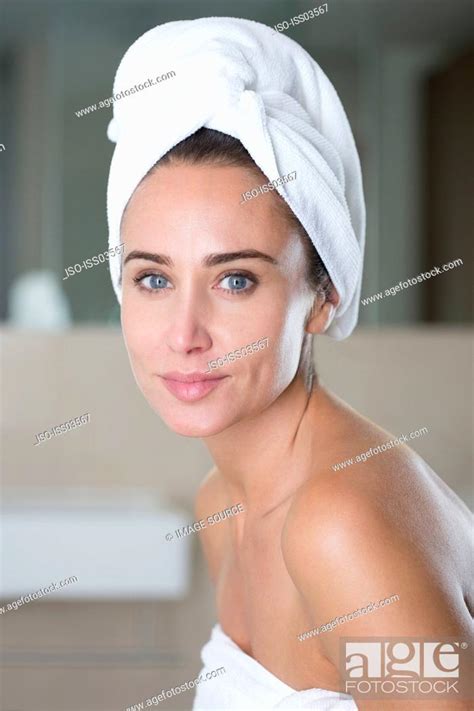 Mid Adult Woman Wearing Towel On Head Stock Photo Picture And Royalty