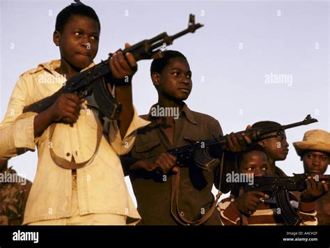 Brandishing Guns Hi Res Stock Photography And Images Alamy
