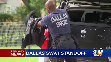 dallas officers confront wanted murder suspect met with gunfire before swat standoff youtube