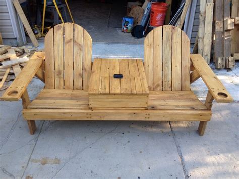 Building an adirondack chair is a fairly simple project. outdoor space by building this double chair bench with table