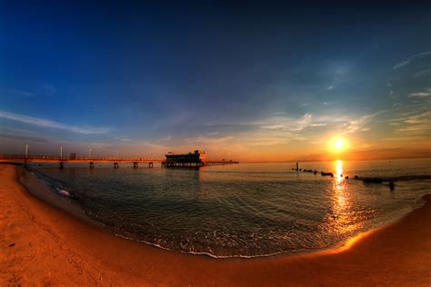 Download Horizon Pier Beach Sea Ocean Photography Sunset Hd Wallpaper