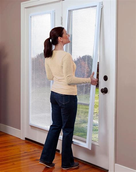 Sliding glass door blinds ideas. ODL Add-on Blinds door window treatments, between the ...