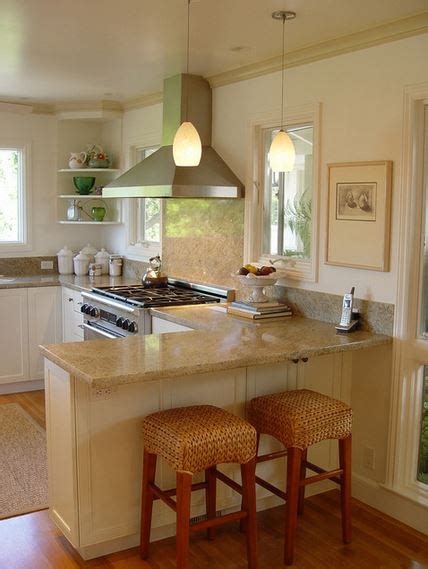 The bar is again the extended arm of the counter. Kitchen Breakfast Bar - Countertop Height or Bar Height?