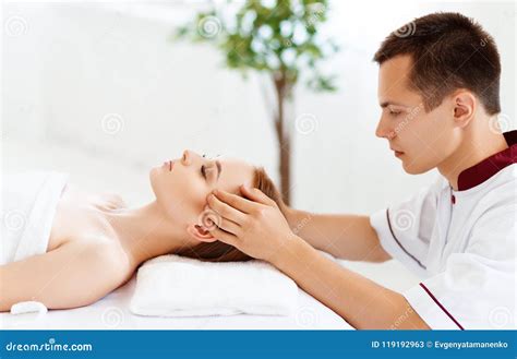 Beautiful Girl Enjoys Massage And Spa Treatments Stock Image Image Of