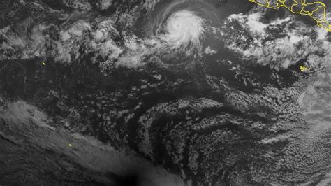 Satellite Captures Solar Eclipse Photobombing Hurricane