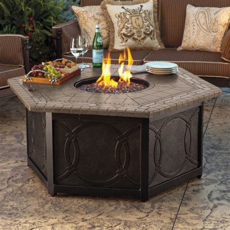If you are burning hemlock on an open pit outdoors, it is safe to bake potatoes or roast hot dogs over the fire. Provenca Custom Gas Fire Table - Frontgate | Fire table ...