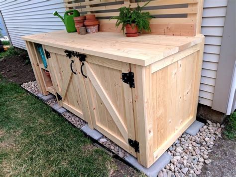 » outdoor trash can storage pdf 20 x 30 cabin plans. Potting Bench with Hidden Garbage Enclosure ...