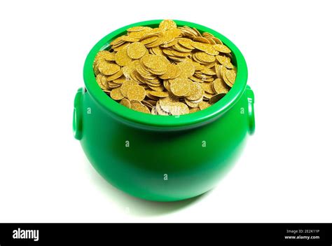 Green Pot Full Of Golden Coins Isolated On A White Background Stock